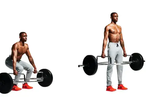 Man performing trap bar deadlifts, shown in both the starting and finishing positions.